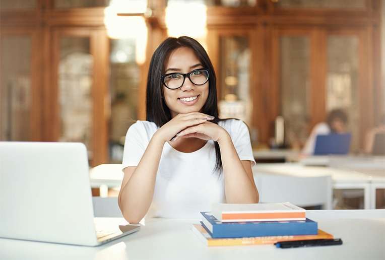 Happy student studying through One-on-One Tutoring